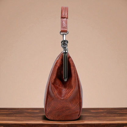 Borsa vintage con chiusura a scatto