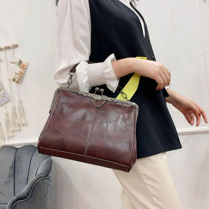 Borsa vintage con chiusura a scatto
